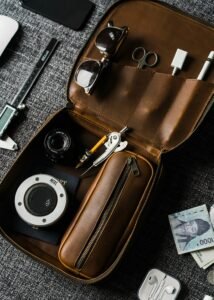 Men's travel grooming kit and toiletry essentials for a hanging Dopp kit guide